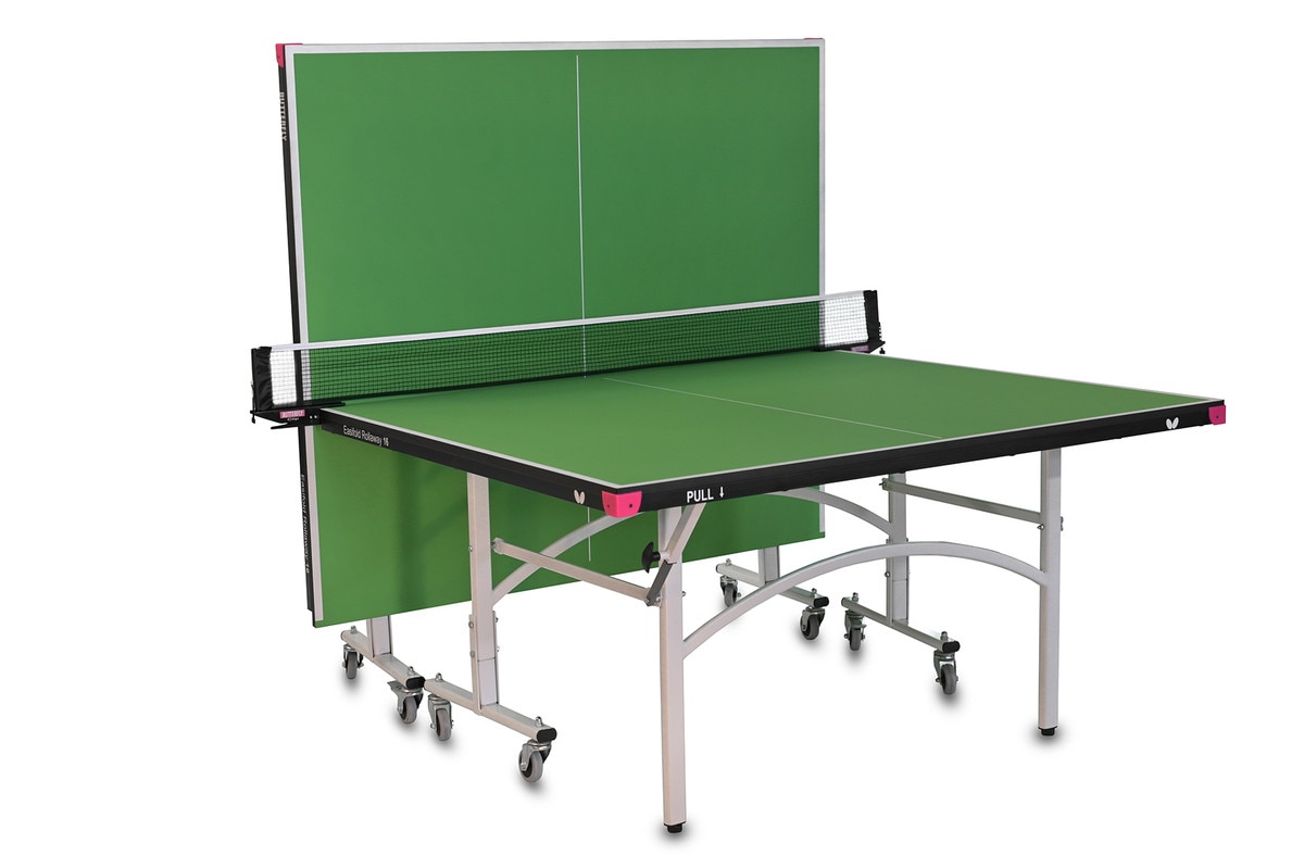 Butterfly Easifold 16 Ping Pong Table, that Features a Green 16mm Thick Top with a Sturdy Frame in the Playback position.